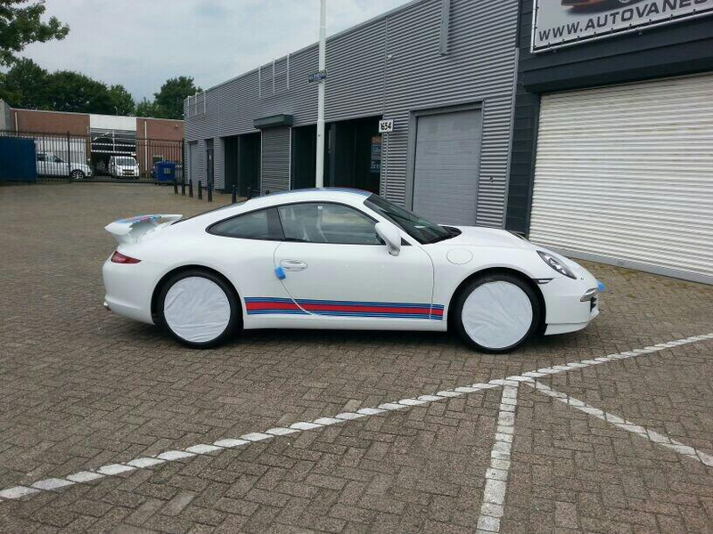 Illustration for article titled Martini Porsche Delivered in the Netherlands